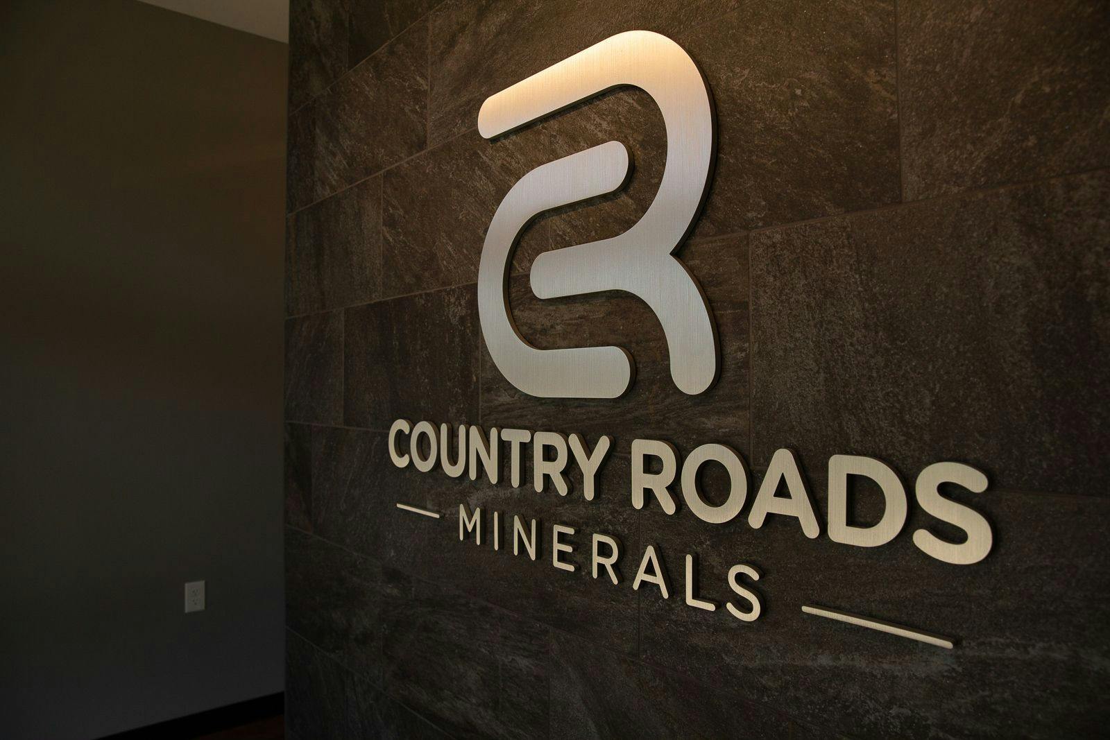 Country Roads Minerals sign on a wall